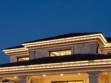 Elegant roofline of a large estate with perfectly installed warm white LEDs at blue hour, sharp architectural details, 35mm