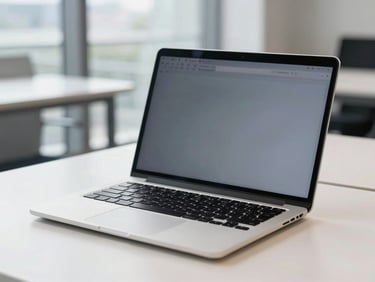 A sleek modern business laptop open on a clean desk, bright corporate daylight, sharp focus.
