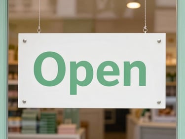 Close-up of a stylish 'Open' sign on a boutique door, natural daylight, warm and inviting, shallow depth of field