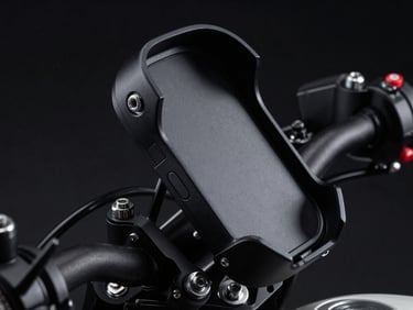 Precision-molded matte black motorcycle phone holder mounted on handlebars, showing robust clamping mechanism, dramatic low-key studio lighting, metallic silver bolts, high-contrast details.