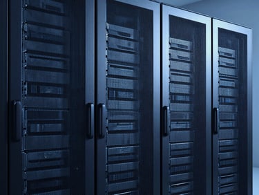 High-end server racks in a data center, cool blue studio lighting, sharp high-contrast shadows, minimalist composition, 50mm lens