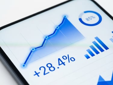 Sleek corporate technology photography, close-up of a mobile interface displaying positive growth metrics in electric cobalt blue, clean high-key studio lighting, sharp focus