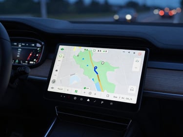 Close-up of a modern black sedan's GPS navigation system showing a map of the Aargau region, subtle interior comfort shots, clean street-level night illumination, sharp details