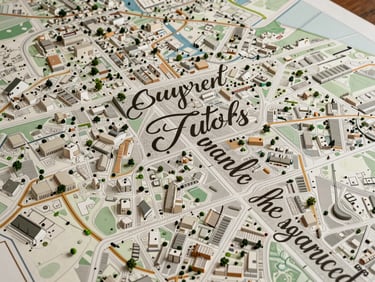 Wide flat-lay of a complex commercial territory map with custom hand-lettered typography and delicate boundary lines, clean studio lighting.