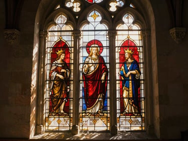 Sunlight streaming through ancient stained glass in a quiet medieval village church in rural France