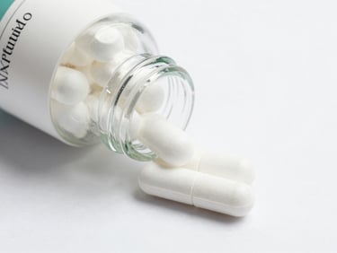 Bright clinical photography, macro detail of elegant glass supplement bottle on a sterile white surface, diffused daylight, 50mm