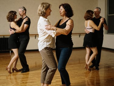 Dancers moving gracefully in a warmly lit studio, showcasing connection and posture, 35mm