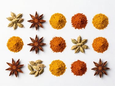 Clean flat-lay arrangement of premium Indian spices, turmeric and cardamom, bright natural daylight, sharp focus