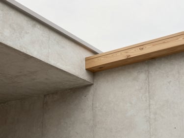 Close-up of clean concrete and wooden architectural details, soft natural overcast daylight, minimal composition, 35mm lens.