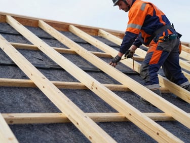 Close-up of wooden roof rafters with insulation materials, professional worker in branded gear, daylight, professional construction photography, 35mm