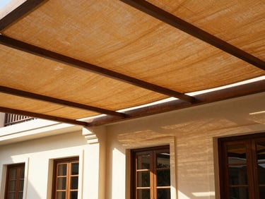 Heavy-duty outdoor fiber shades shielding a luxury farmhouse patio from intense Karachi midday sun