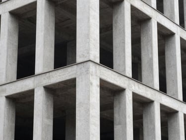 Close up of structural steel joints and concrete pillars at a municipal building site, crisp architectural photography.