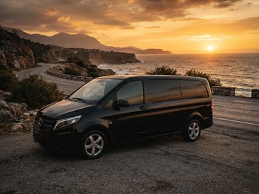 Sleek black Mercedes Vito exterior profile parked on an Antalya coastal road at sunset, warm golden-hour light reflecting off the polished paint, dramatic low-key lighting, 50mm lens