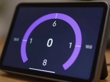 Close-up of an interactive telemetry widget displaying real-time system stats with glowing violet progress arcs, dark background.