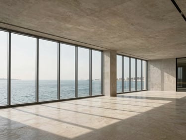 Empty luxury apartment interior in Dubai Marina, floor-to-ceiling windows facing the water, afternoon north-facing light, clean concrete ceiling and pale stone floors showing proportion