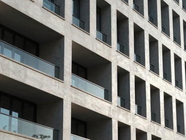 Modern architectural details showing structural alignment, cool daylight with sharp clean shadows, minimalist corporate perspective.