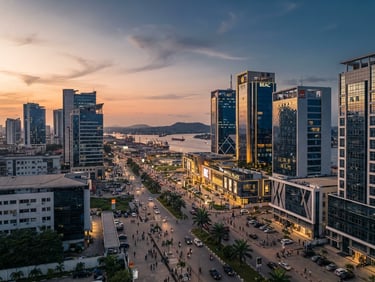 Wide-angle architectural view of Douala business district at sunset, modern corporate structures with clean lines, soft natural daylight, premium editorial style.