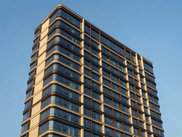 Architectural exterior of a sleek contemporary high-rise building facade in Lower Parel Mumbai under clear blue sky