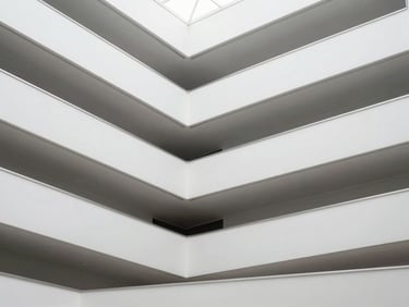 Abstract architectural geometry, clean lines, and soft light, representing structured governance and digital infrastructure.