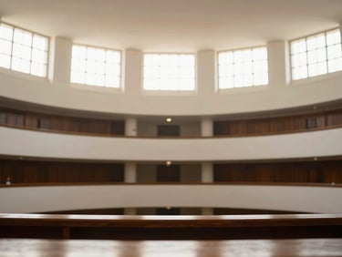 Wide angle architectural photograph of the Mexican legislative palace chamber, warm natural light streaming through high windows, clean modern lines, soft depth of field, 35mm