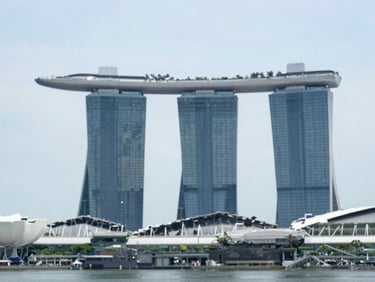 Modern Singapore skyline with Marina Bay Sands under bright daylight, clean editorial photography, shallow depth of field