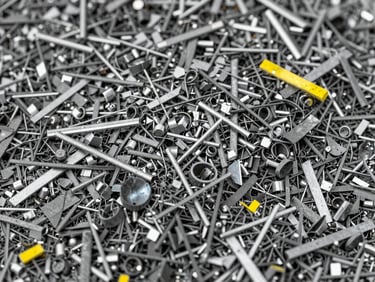 Macro detail of clean industrial metal shavings and aluminum scraps, high contrast lighting