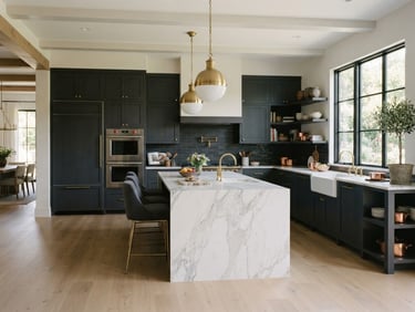 Wide architectural shot of a luxury kitchen with deep charcoal cabinetry, brushed brass hardware, and soft morning window light, 35mm.