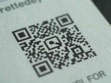 Macro close-up of a physical delivery receipt with a secure cryptographic QR code printed on textured paper, natural high-contrast daylight, sharp 35mm lens