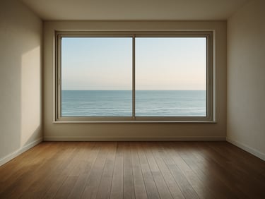Interior detail of a Capbreton apartment, wide window framing a sea horizon at soft morning light, timber floor in foreground, no furniture, showing raw potential of the space
