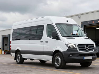 Mercedes Sprinter van at a loading dock under overcast sky, wide environmental shot showing the full vehicle length, driver reviewing route on mounted tablet inside cab