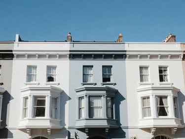 Bright architectural photo of Victorian terrace houses in Paddington Sydney, clean daylight, blue sky