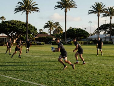 Rugby players practicing on a lush green field surrounded by palm trees, golden hour light, action photojournalism.