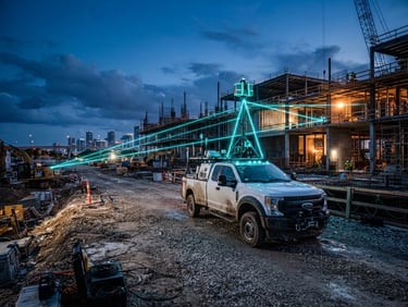 Wide shot of a specialized 3D laser scanning vehicle parked on a construction site at dusk, high-contrast industrial lighting, neon cyan accents from scanning beams, low horizon, Florida.
