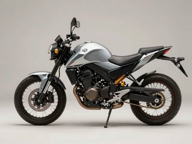45-degree quartering shot of a 125cc urban motorcycle on a clean studio surface, neutral daylight highlighting the fuel tank badge, side panels, and rear suspension detail, no rider present