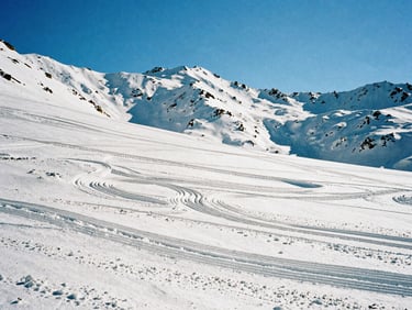 Topographic lines overlaid on a crisp high-contrast snow landscape under bright winter sun, 35mm