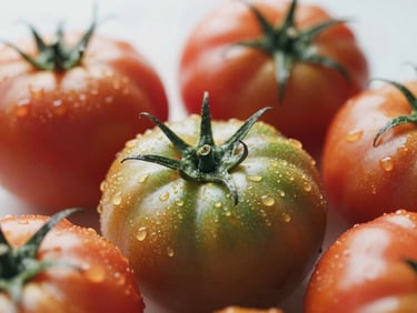 Macro shot of fresh heirloom tomatoes with water droplets, soft natural daylight, shallow depth of field