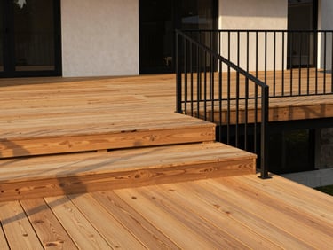 A modern multi-level hardwood deck with clean lines, minimalist black metal railings, integrating perfectly with the home's rear architecture.