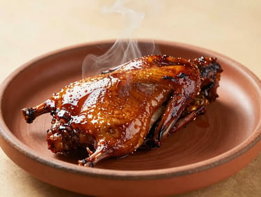 Grilled duck with a rich dark glaze on a rustic clay plate, steam rising gently, warm side-light