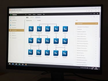 A high-contrast monitor displaying complex DevOps pipeline configurations, Docker containers, and live deployment logs with subtle gold accents.
