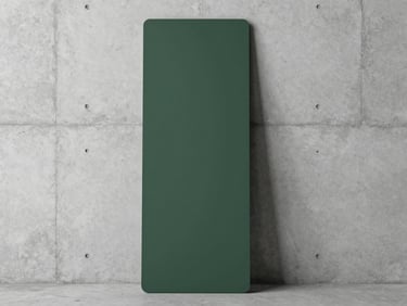 Minimalist walking pad stored vertically against a concrete wall, architectural interior, clean lines