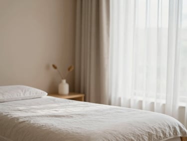 Soft-focus serene spa treatment room interior, minimalist wood and linen elements, gentle natural light filtering through sheer curtains