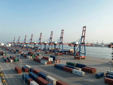 Smart port logistics terminal in Chile, automated shipping containers, cool morning light, high-tech industrial photography.