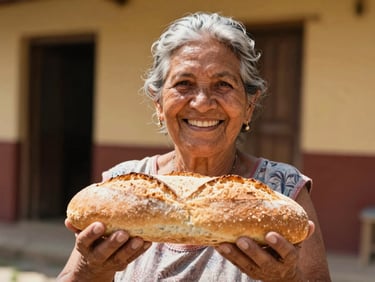 Portrait of a smiling Venezuelan grandmother holding a fresh loaf of bread, warm natural golden sunlight, authentic human connection, shallow depth of field, 35mm