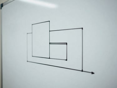 Crisp, minimalist architectural system diagram on a physical whiteboard, cool natural lighting, clean lines, macro focus, no people.