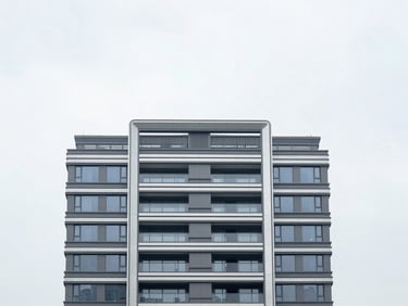 Architectural details of an ongoing property development, clean lines, bright overcast daylight, 35mm