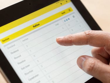 Close-up of a digital tablet displaying a clear electrical repair estimate, professional hands pointing, high-contrast, electric yellow UI elements.