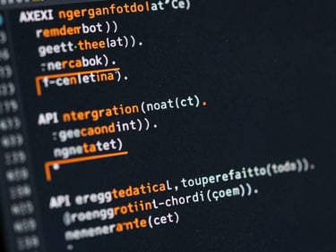 Macro close-up of a clean dark-mode code block showing API integration with orange highlight lines, sharp focus, low-key lighting