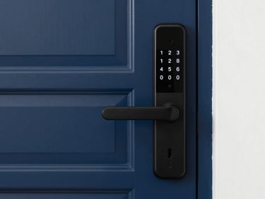 A modern matte black smart lock mounted on a clean residential door, glowing keypad, crisp architectural lighting.