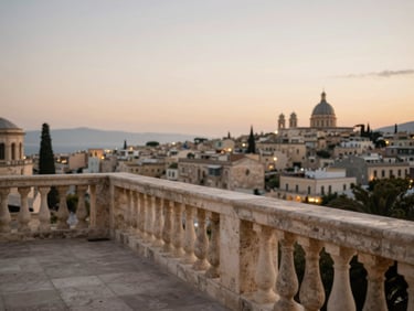 A secluded stone balcony overlooking a historic Mediterranean city at dusk, soft warm lighting, elegant editorial travel photography.