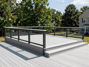 Wide shot of a newly constructed custom composite deck with modern railings, integrated into a Northern Virginia backyard, clear afternoon light, 35mm